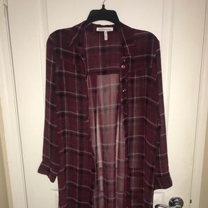 Long button down sheer blouse.